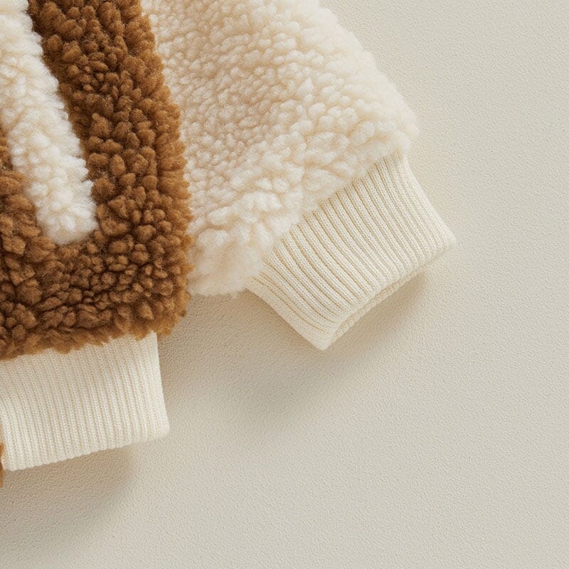 Veste à boutons duveteux pour tout-petits